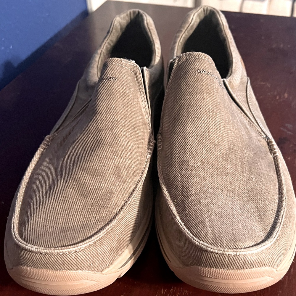 Skechers casual slip on shoes. 14